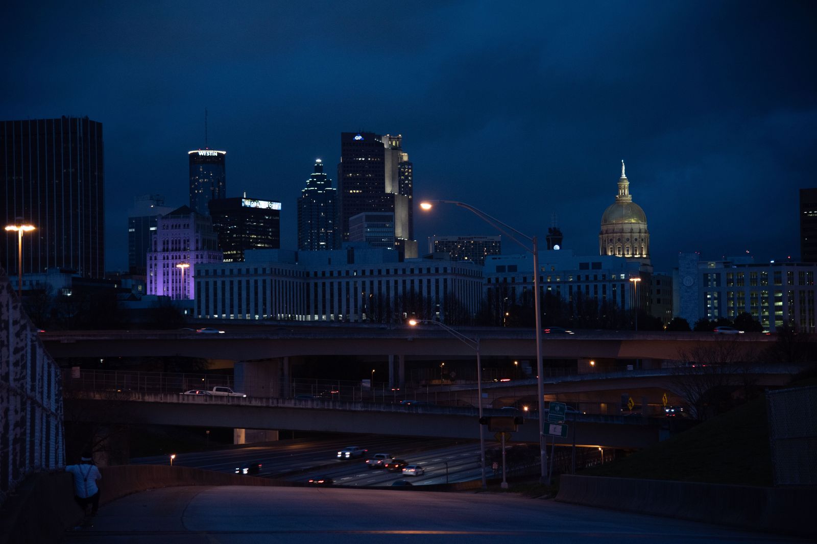 Black SUV on Peachtree Street at night