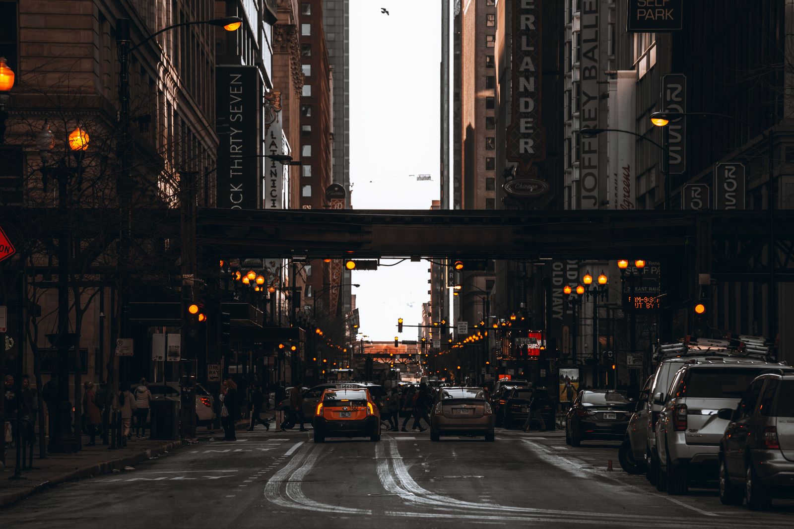 Black sedan on a Chicago Loop street in winter