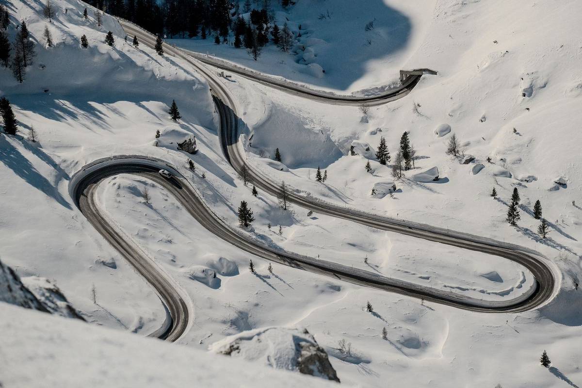 Hairpin mountain road in winter on the way up to a ski resort
