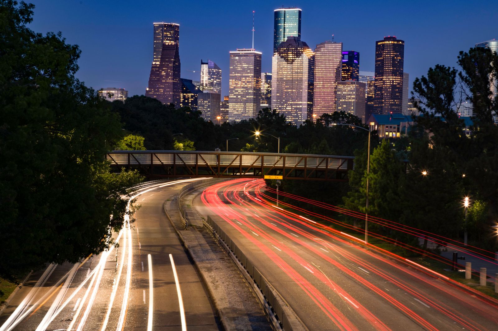 Black SUV on a Texas highway at night