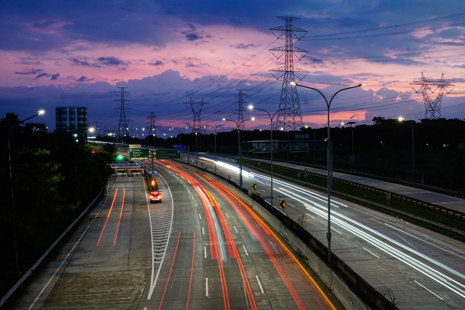 Elevated toll road with evening traffic in Jakarta