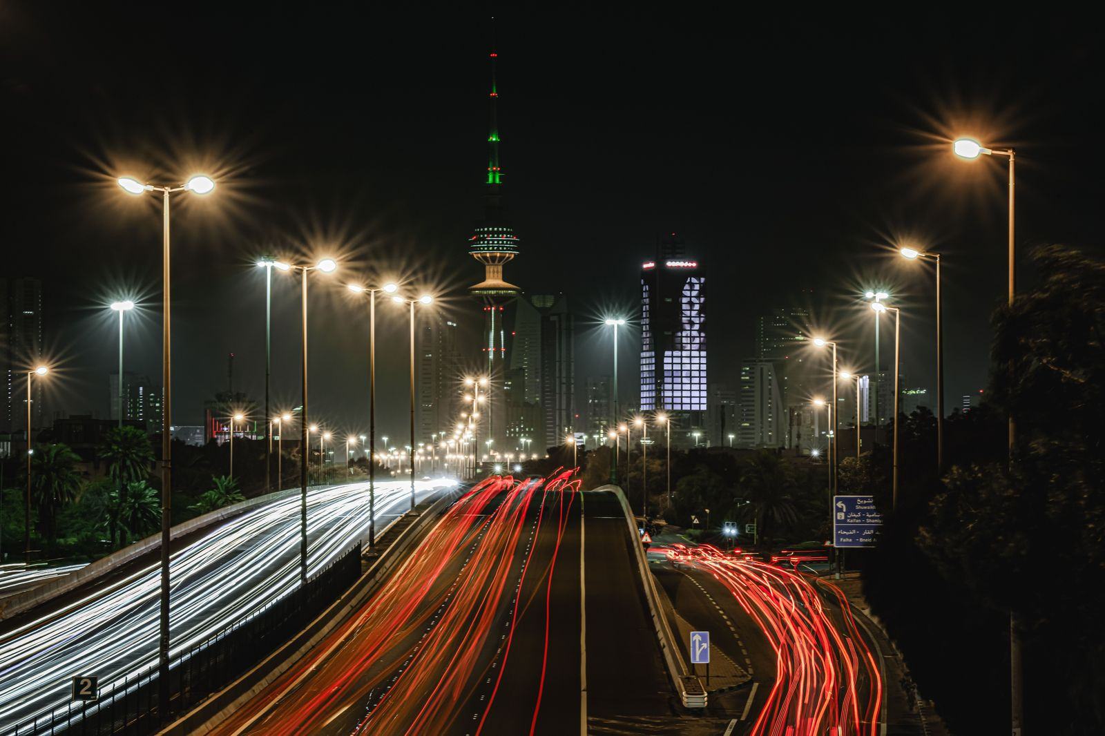 Highway and towers in Kuwait City at night