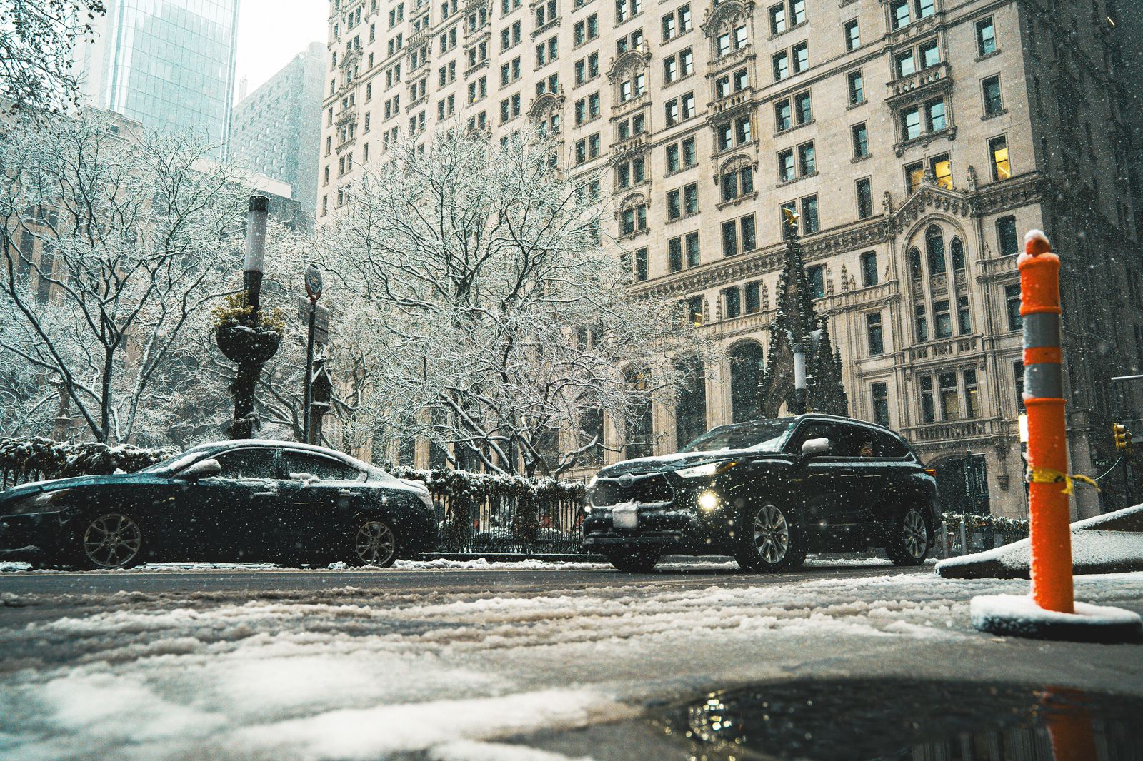 Black car on a snowy downtown Minneapolis street