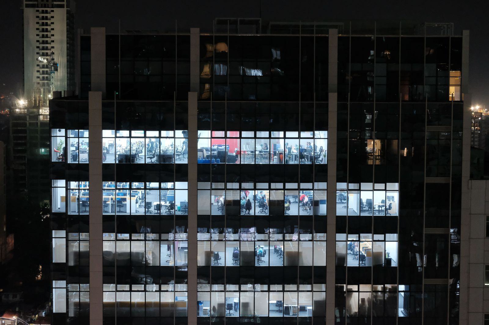 Office towers in Gurugram lit at night