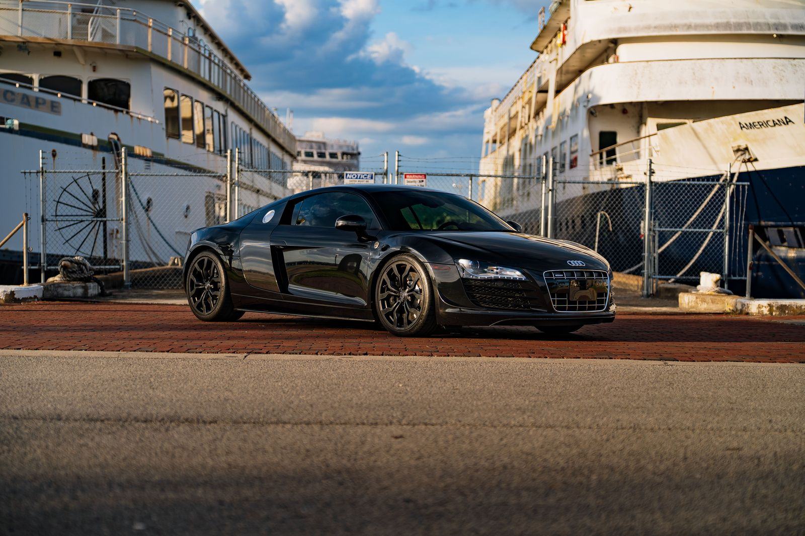 Luxury car waiting by the riverside quay in Perth at night