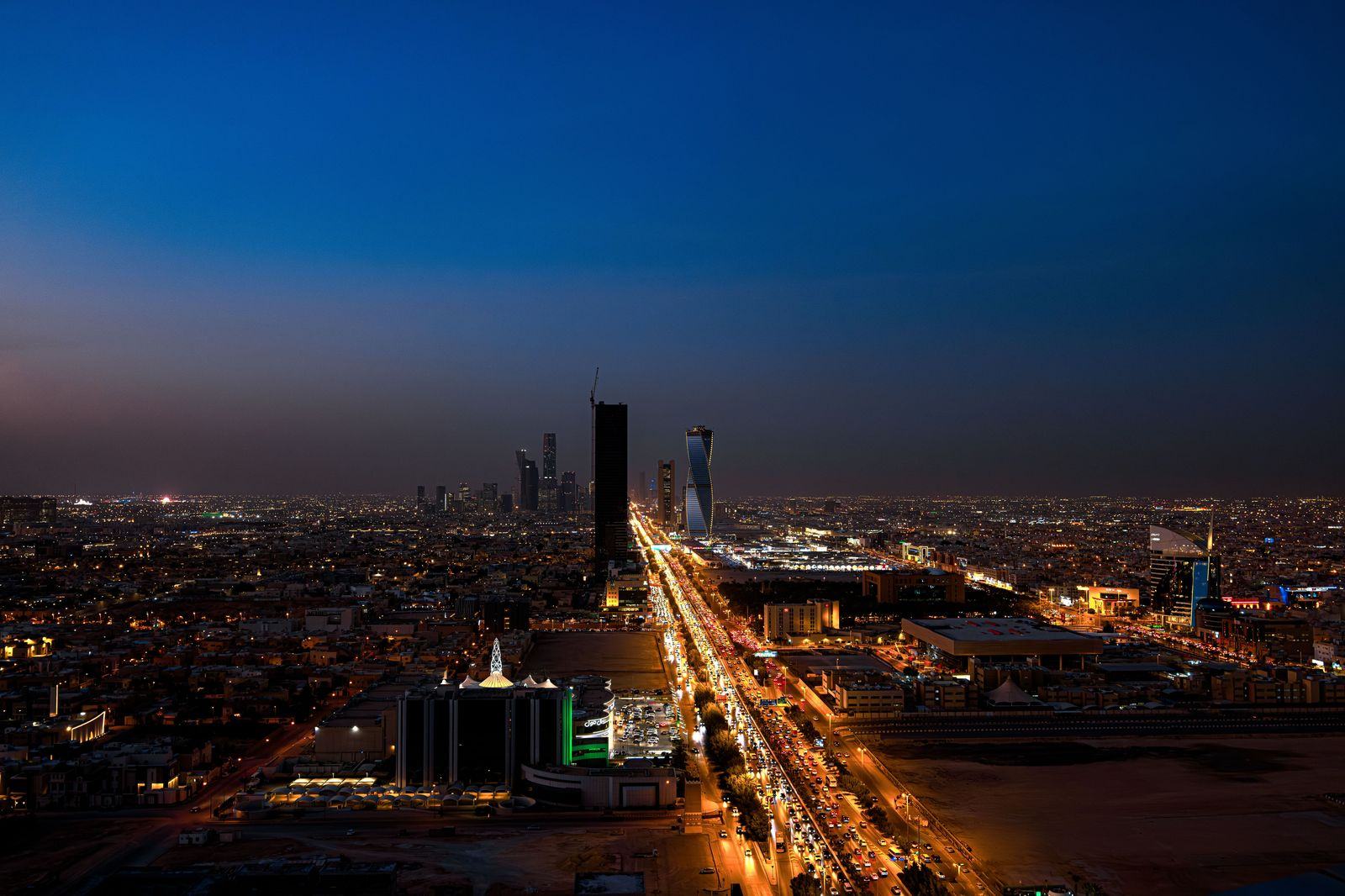 Towers of the financial district above a Riyadh highway