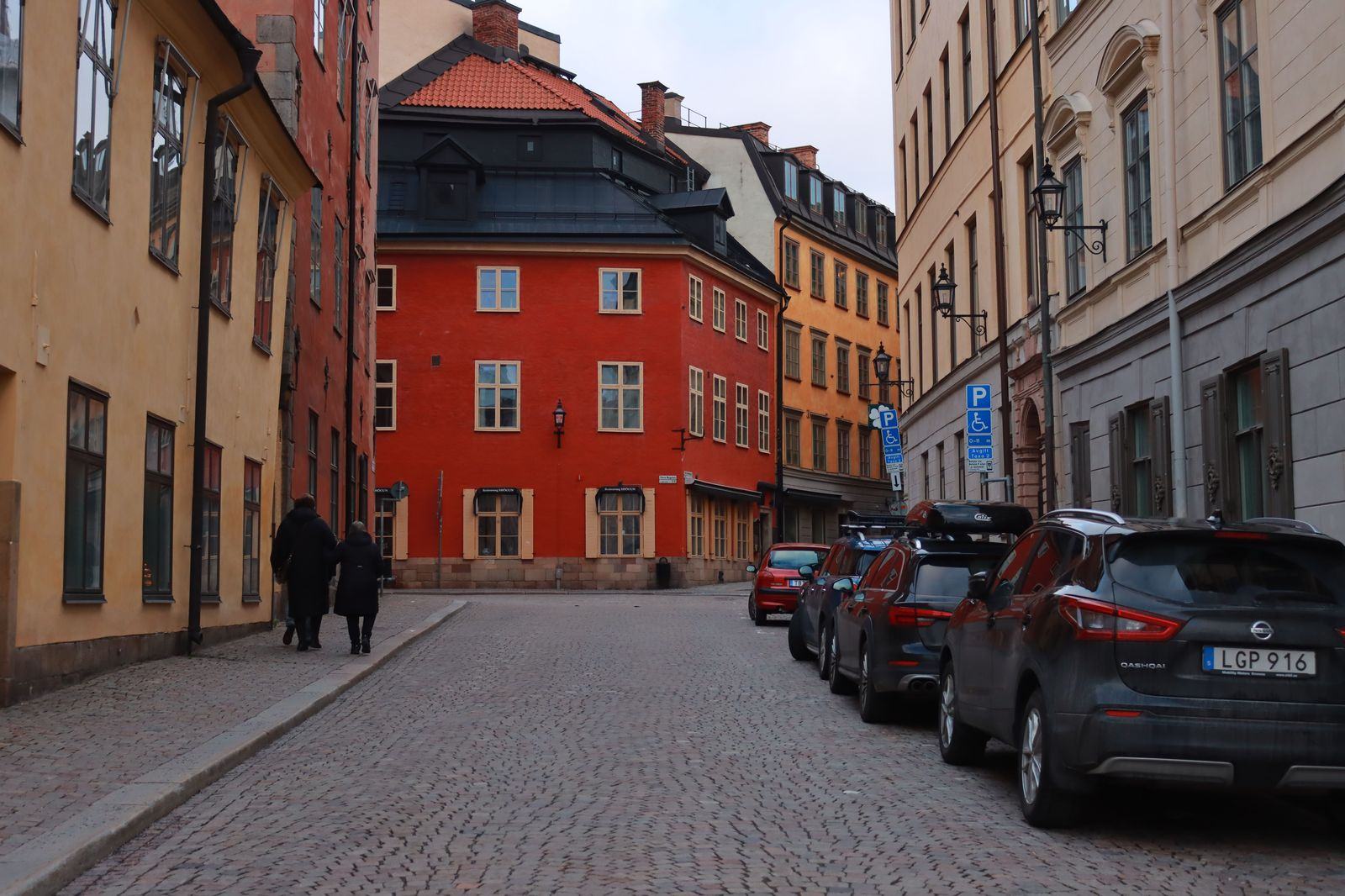 A black car on a Stockholm street in winter